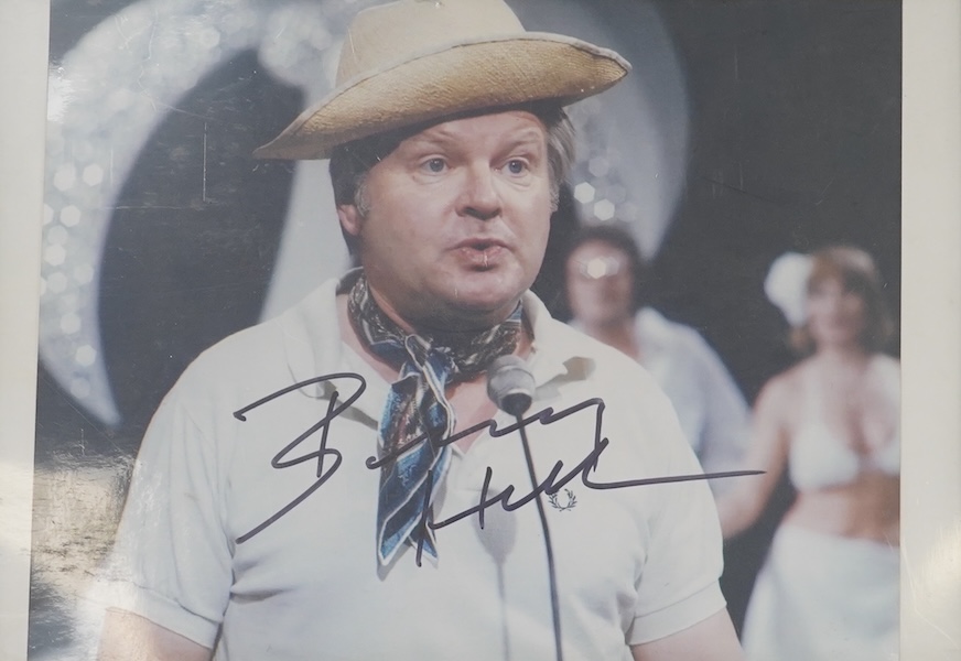 A signed photograph of Benny Hill, framed. Condition - good